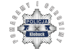 Policyjna gwiazda z napisem Policja Kłobuck Pomagamy i Chronimy.